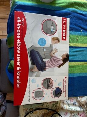 Skip Hop gray and red Moby all-in-one elbow saver & kneeler